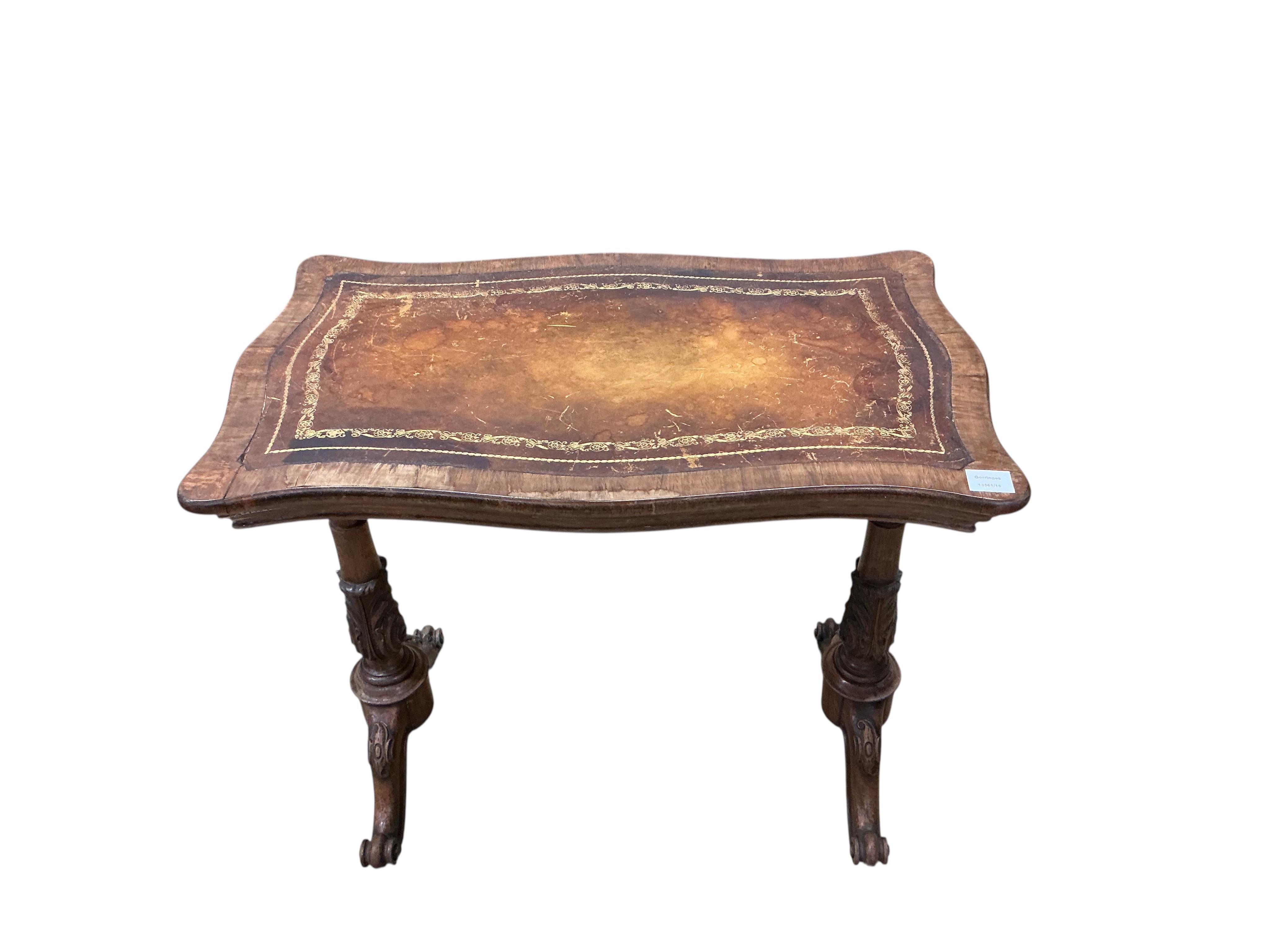 An early Victorian rosewood serpentine folding writing, jardiniere table, width 80cm, depth 49cm, height 71cm
